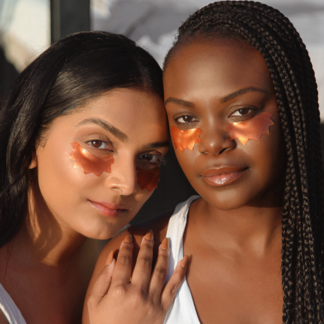 Founder Deepica and a model showcasing the sun ray eye masks