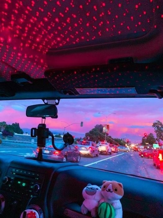One reviewer showing off the star projector in their car