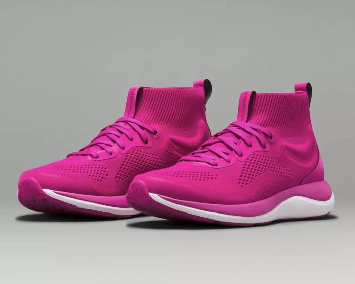The pink sneakers.