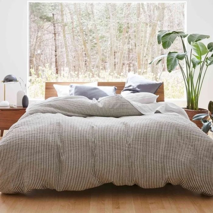 Duvet cover in Charcoal Chambray and White Stripe, merging modern charm with a refined, relaxed aesthetic.