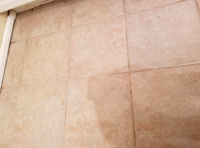 tile floor with light beige grout, freshly cleaned