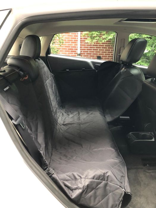 The black seat cover shown in the car bench style.