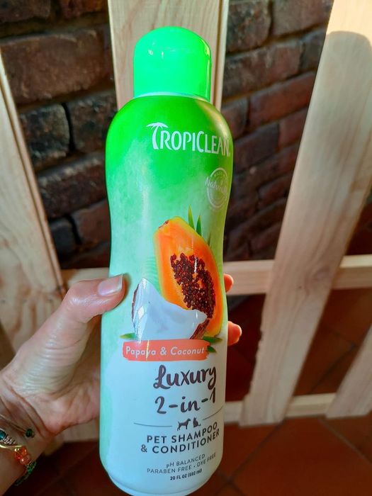 Photo from a reviewer showing the dog wash with a delightful papaya and coconut scent.