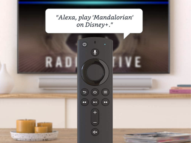 A slim black remote control with small buttons, including one that lets you talk into it.