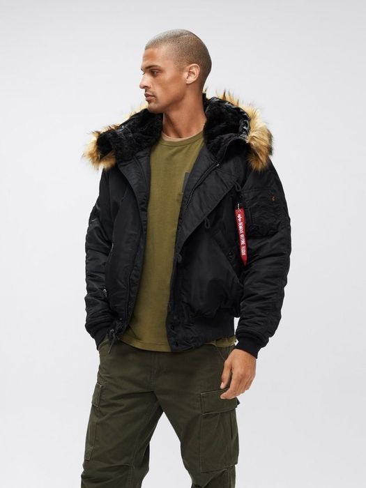 Model wearing the parka in black
