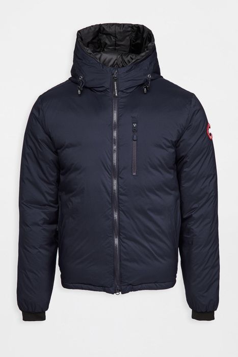 A navy Canada Goose jacket perfect for cold weather.
