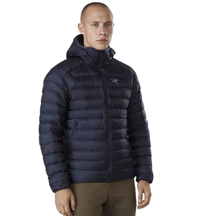 A model is shown wearing the Arc'teryx hoodie in navy.