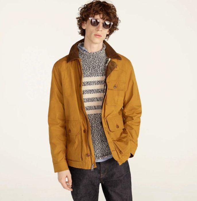 Model wearing the jacket in burnt saffron