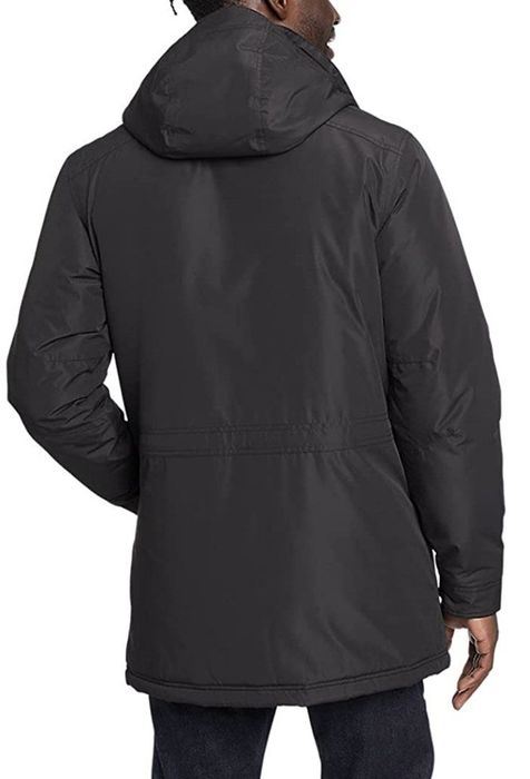 Back view of the same model in the Eddie Bauer jacket in black