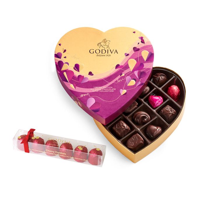 A heart-shaped box brimming with delicious dark chocolates.