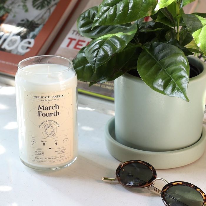 a candle with the inscription 'march fourth'