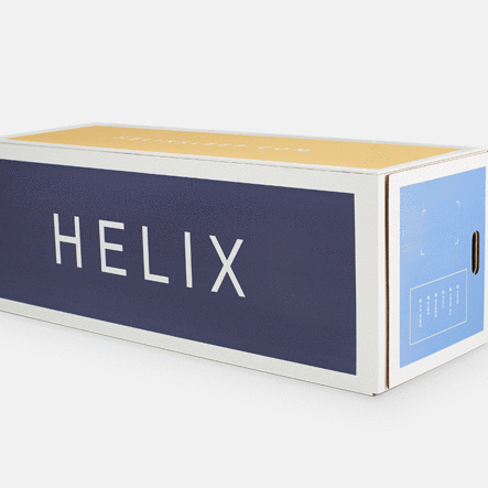 The Helix Sleep mattress arrives neatly packed in its box, awaiting setup.