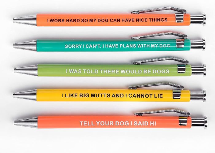 Five pens adorned with humorous sayings that only dog enthusiasts can truly appreciate.