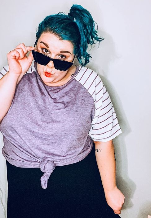 Reviewer wearing the soft purple top