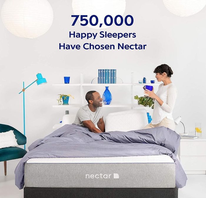 Models enjoying a peaceful sleep on a memory foam mattress that comes with two free pillows