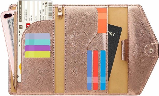 The rose gold wallet is opened to reveal how much it can hold, blending functionality with style.