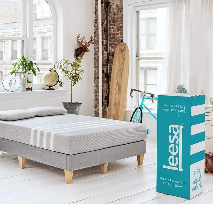 A mattress made of breathable cotton memory foam, comfortably placed on a bed.