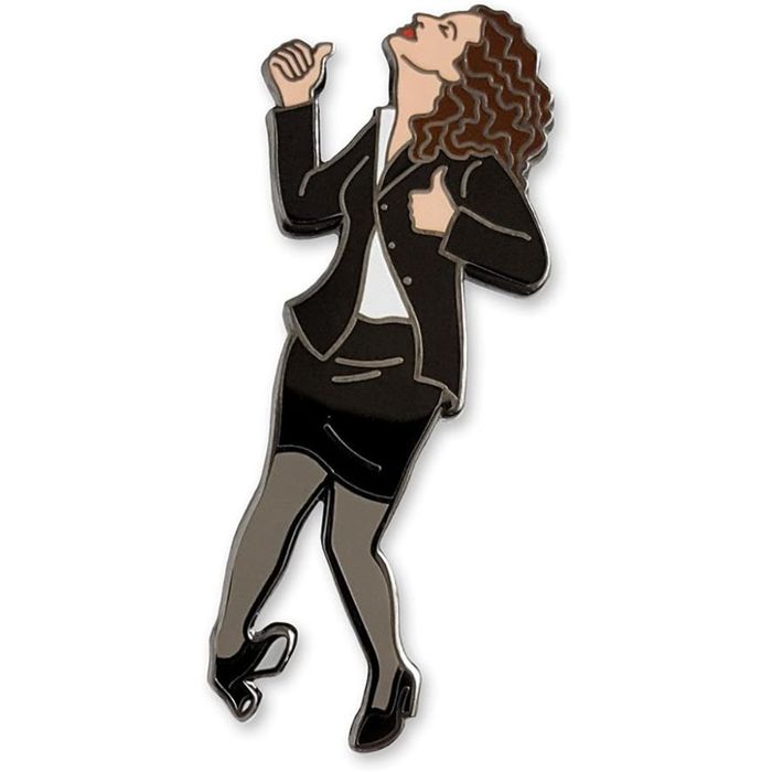 A pin depicting Elaine from Seinfeld performing her signature little kicks dance