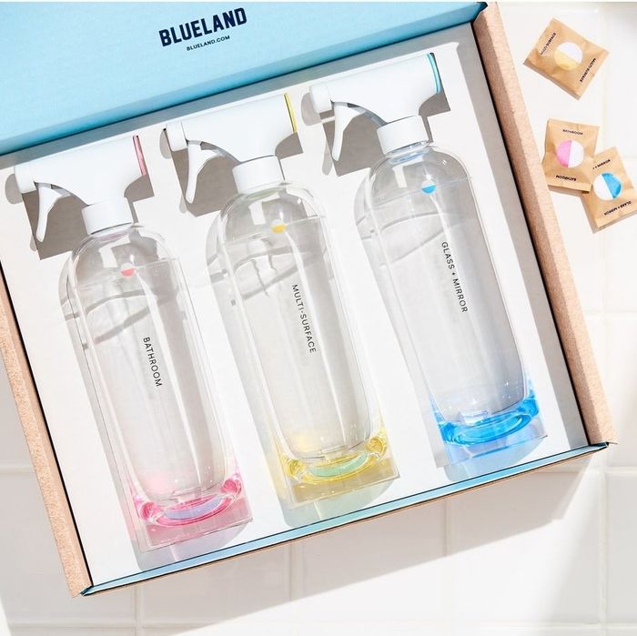 A Blueland box containing three reusable spray bottles labeled