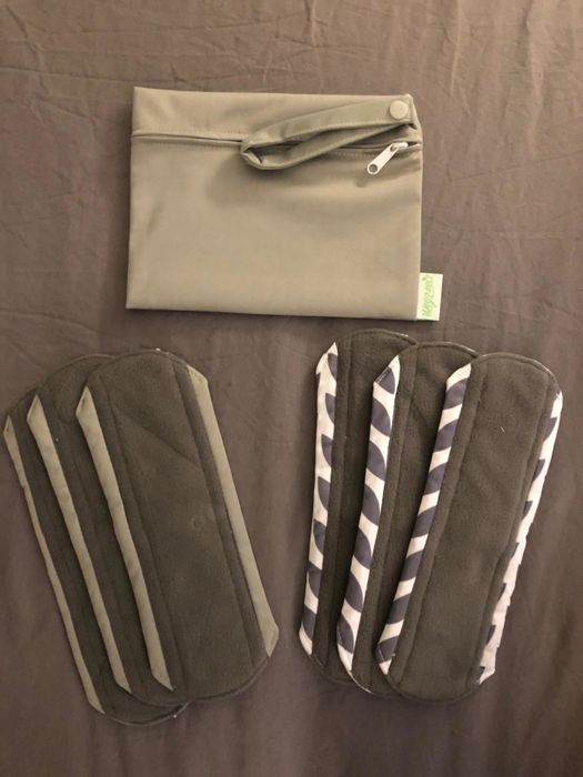 A reviewer's image displaying a collection of printed reusable pads.