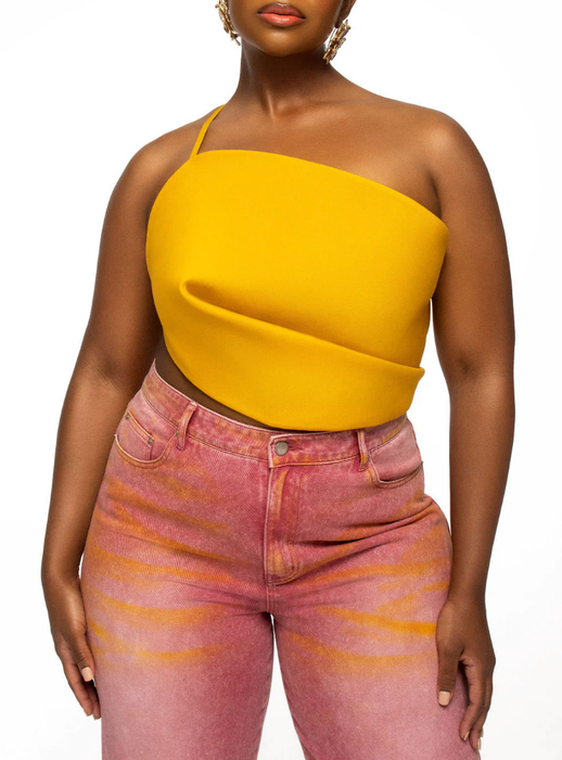 A model wearing the yellow rose petal top.