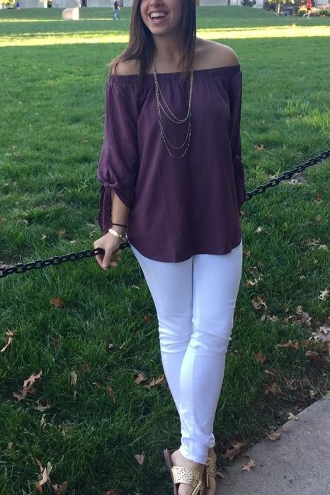 A customer review photo of them wearing the top in burgundy