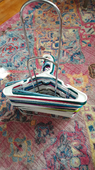 The hangers neatly organized using the stacker, eliminating the mess.