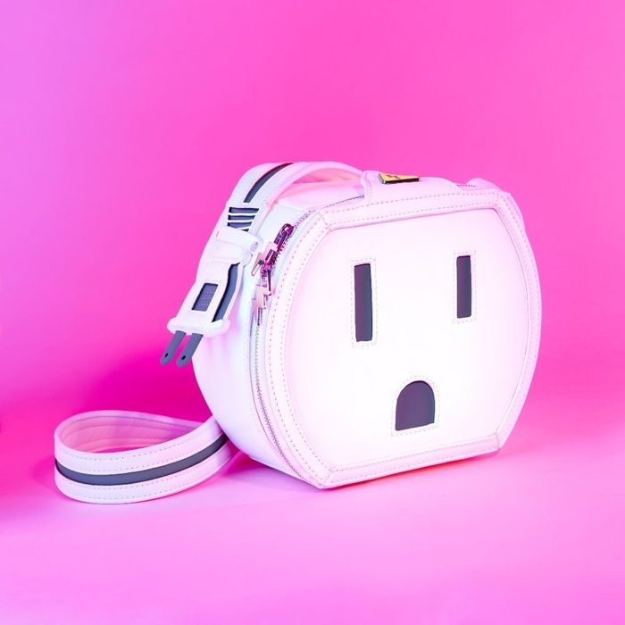A close-up of the bag featuring the plug-shaped strap.