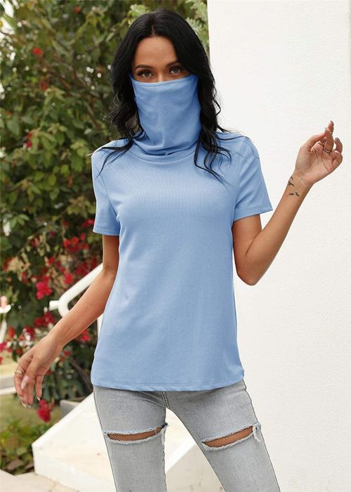 A model sporting the blue T-shirt with the mask raised up