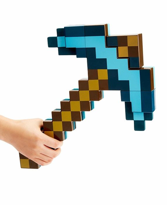 a hand gripping a pixelated-style pickaxe