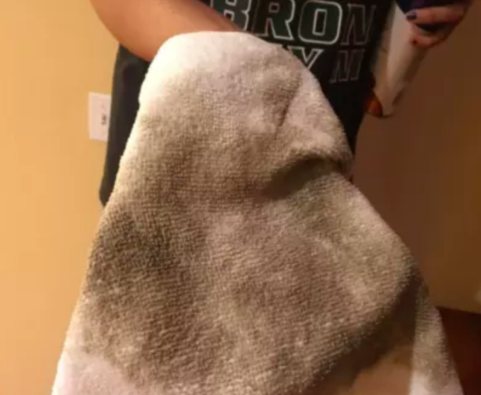 Cloth used to clean the bannister, now covered in dust