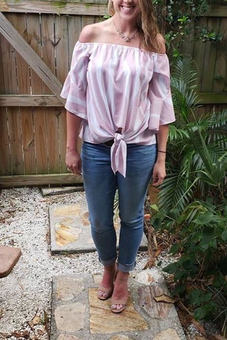 A customer review photo of the pink top