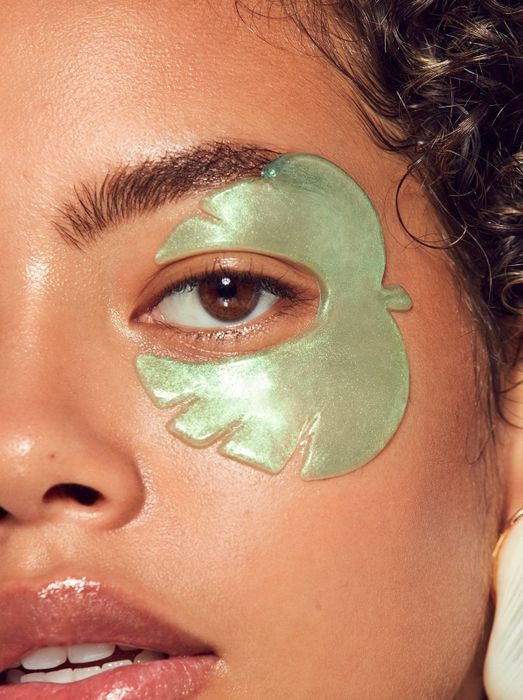 model sporting the green eye masks