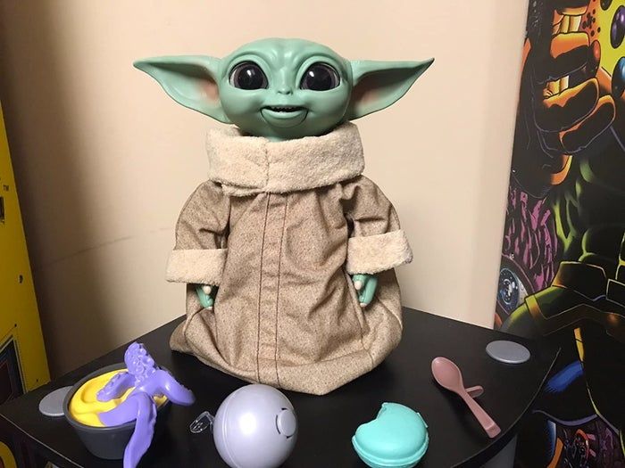 The Grogu toy, complete with all of its accessories.