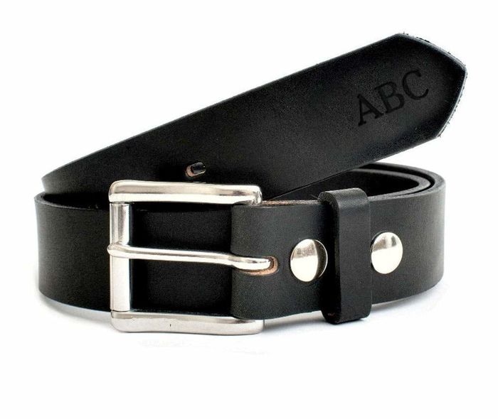 close-up view of the black belt with an example of where the monogram is placed
