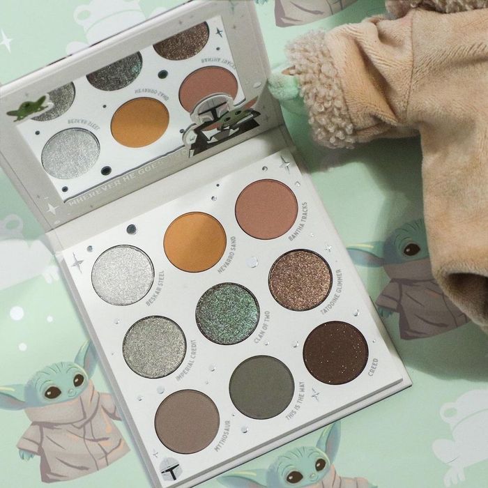 A nine-shade eyeshadow palette featuring a mix of neutral and earthy tones, perfect for versatile looks.