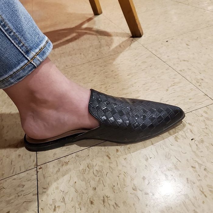 Another reviewer shows off a pair of stylish black loafers.