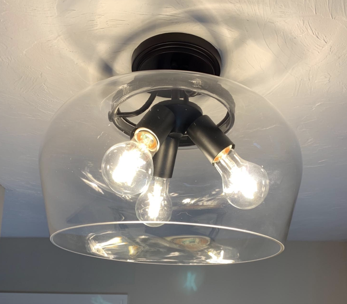 The glass light fixture has been thoroughly cleaned, according to reviewers.