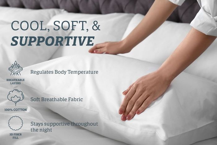 Hands adjusting pillows with text emphasizing benefits: breathable layers, 100% cotton, temperature regulation, and all-night support