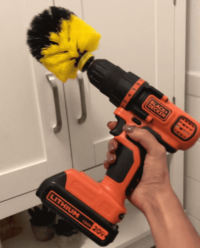 Gif of a Mytour editor holding a Black & Decker drill with the brush attachment in place