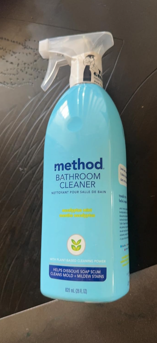 Method Bathroom Cleaner spray bottle with mint eucalyptus scent, 28 fl oz. Label emphasizes plant-based cleaning and mold and mildew removal