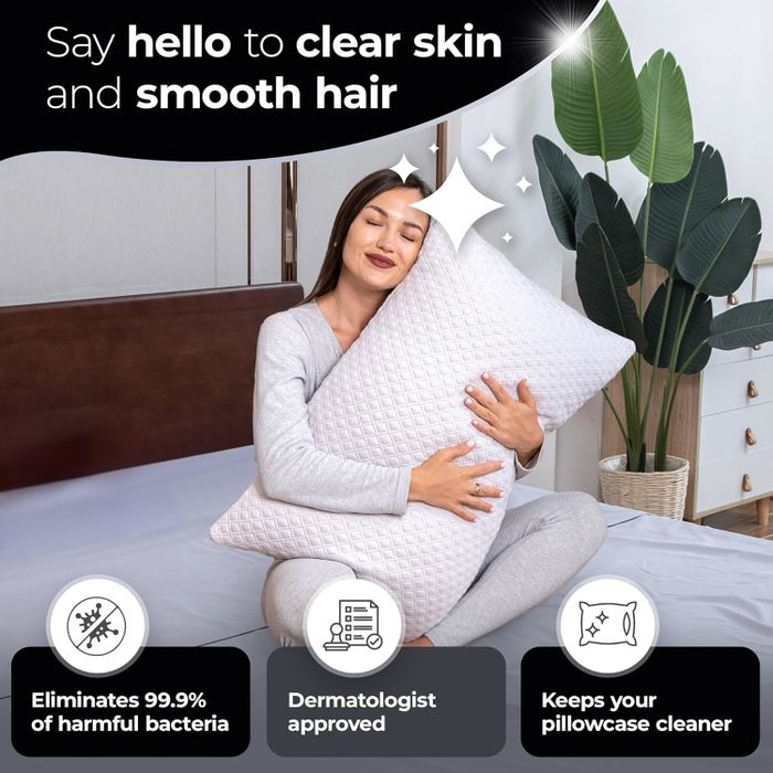 A woman embraces a pillow in her bedroom, highlighting its benefits: eliminates 99.9% of bacteria, dermatologist-approved, and stays cleaner longer