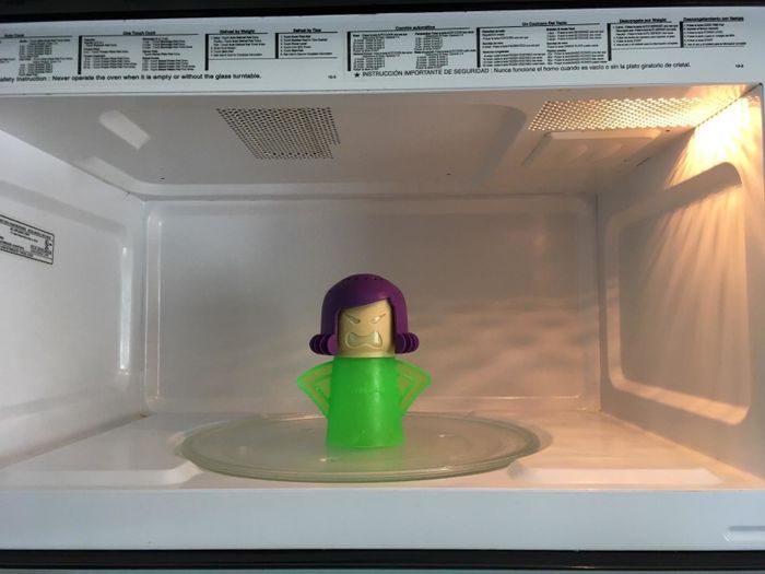 The same microwave now completely free of stains.