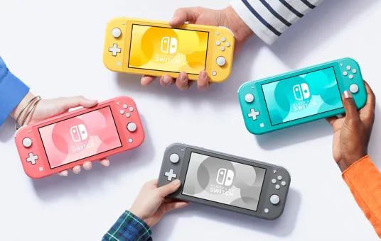 A Nintendo Switch Lite in yellow, gray, blue, and pink colors