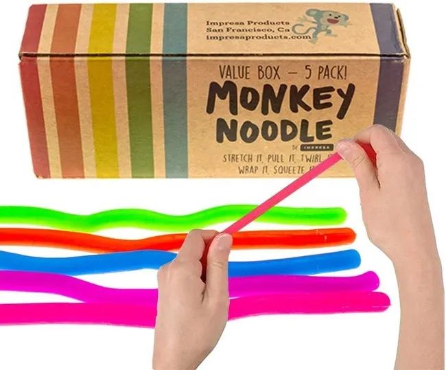 A model playfully stretching a noodle-like toy