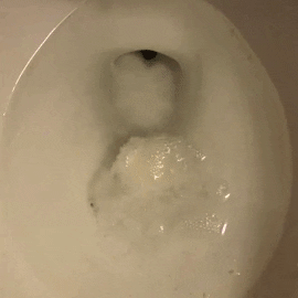 Animated image showing a toilet tablet fizzing and dissolving