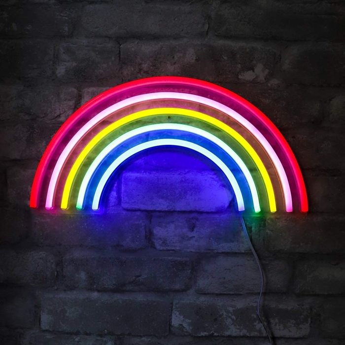 Rainbow neon light illuminating the wall