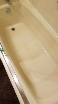 A bathtub floor now spotlessly clean