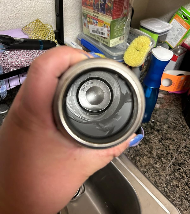 An after image showing the mug now spotless and clean.