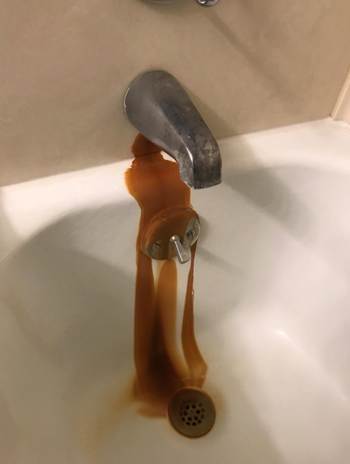 Rust stains from a leaky bathtub faucet